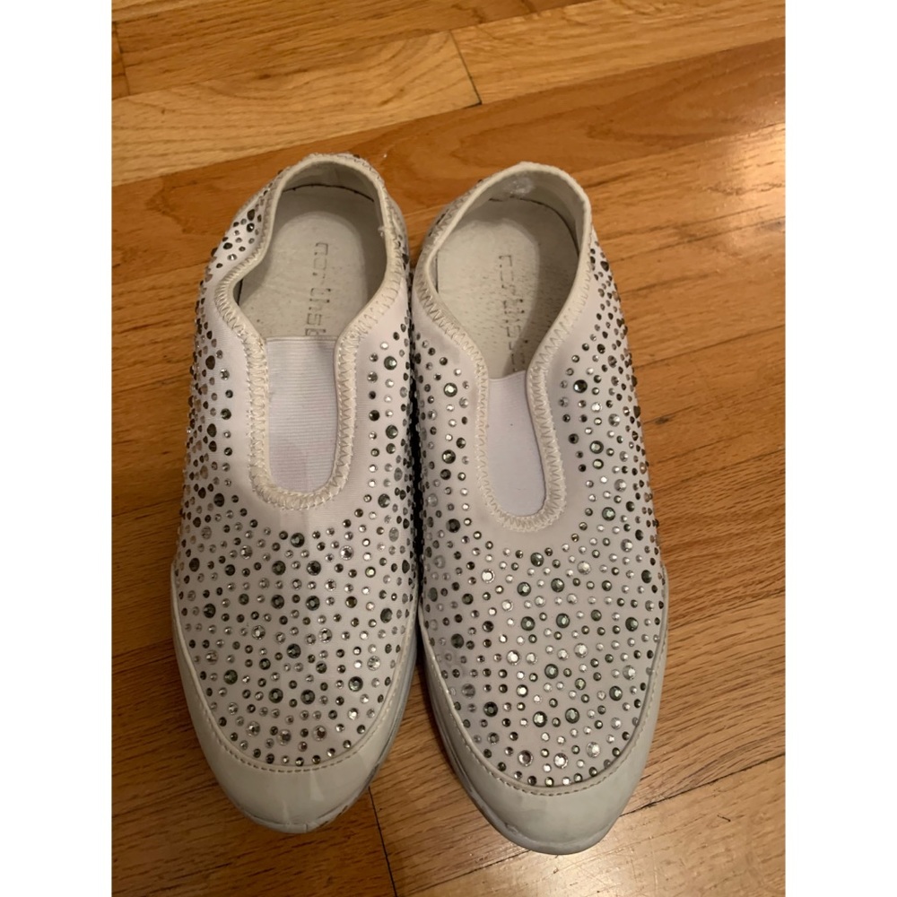 Northstar white slip ons